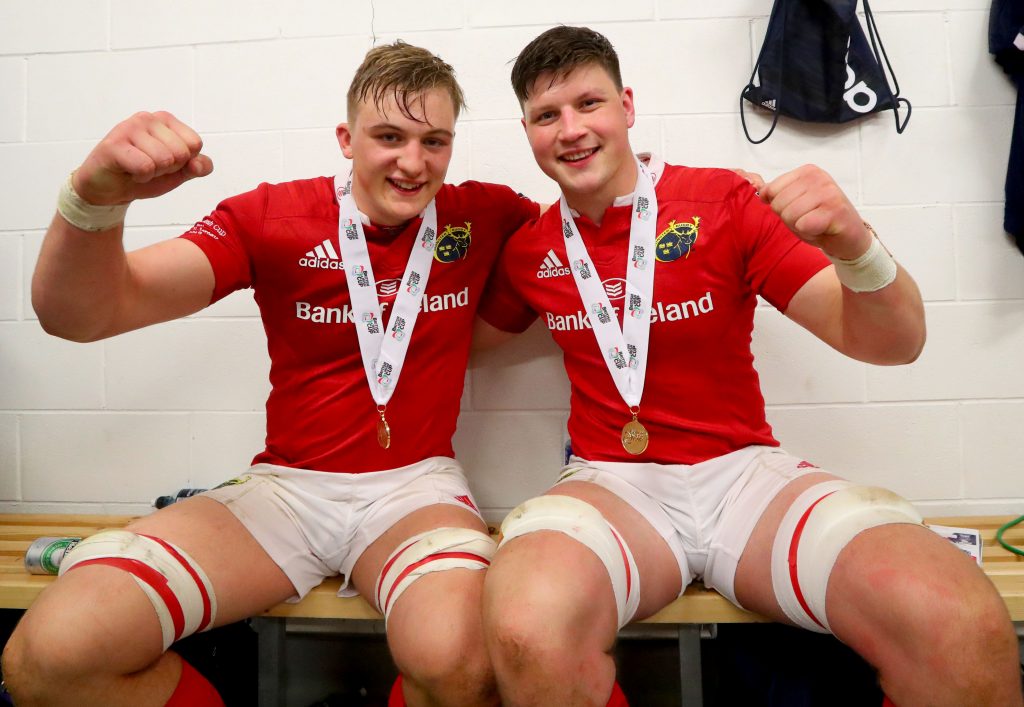 The academy's Gavin Coombes and Fineen Wycherley celebrate B&I Cup success on Friday night.