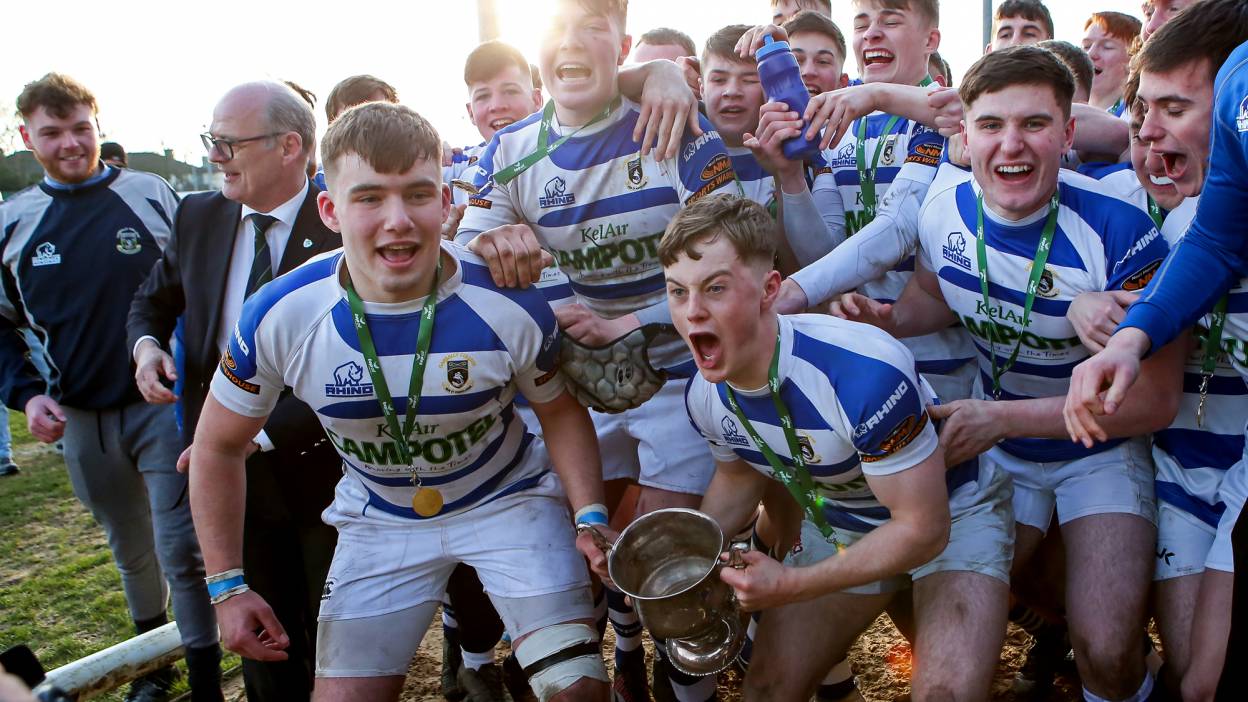 Young players lift a trophy Young players lift a trophy