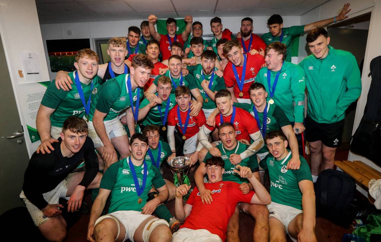 The Ireland Under-20s celebrate with the trophy in the dressing room after being crowned U-20 Six Nations Grand Slam champions in Colwyn Bay ©INPHO/Ryan Byrne The Ireland Under-20s celebrate with the trophy in the dressing room after being crowned U-20 Six Nations Grand Slam champions in Colwyn Bay ©INPHO/Ryan Byrne