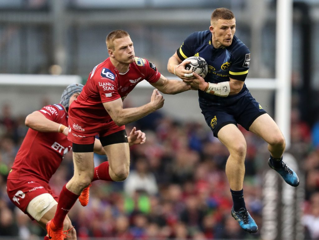 Johnny McNicholl and Andrew Conway compete in the air.