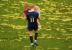 Keith Earls and his daughters Ella May and Laurie after the game.