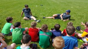 Bill Johnston and Tyler Bleyendaal meet the summer camp participants at Bruff RFC.