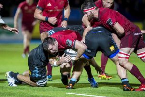 Niall Scannell looks to make the hard yards in the tackle.