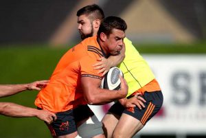 Duncan Casey makes the tackle on CJ Stander.