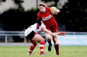 Try scorer Niamh Kavanagh takes on Ulster's Rebecca Smyth at Garryowen FC
