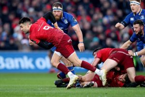 Conor Murray looks to move the ball away
