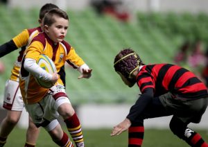 A Bruff RFC youth player on the attack
