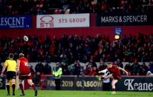 Rory Scannell kicks the winning penalty.