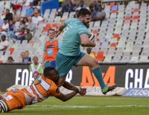 Kevin O'Byrne gets past Junior Pokomela to score a try.