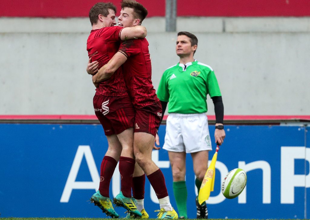 Alex McHenry celebrates scoring his try with Neil Cronin.