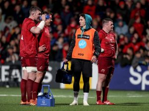 Peter O'Mahony and CJ Stander with Joey Carbery.