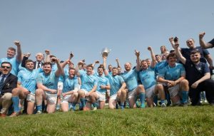 Garryowen players celebrate after the game with the Bateman Cup