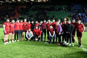The Munster squad with supporters after beating Benetton in Italy.