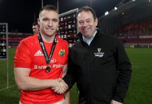 Rory Scannell is presented with the Guinness Man of the Match award.
