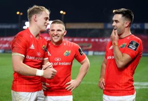 Mike Haley, Andrew Conway and Conor Murray celebrate after the game.