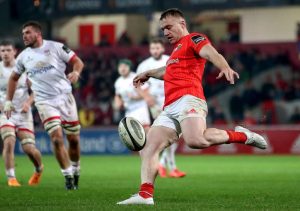 Rory Scannell makes a clearance.