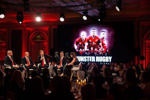 The Munster coaching team on stage at the Munster Rugby London Dinner.