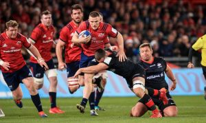 Andrew Conway tackled by Ben Earl.