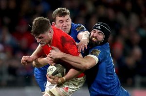Jack O’Donoghue is tackled by Ross Molony and Scott Fardy.