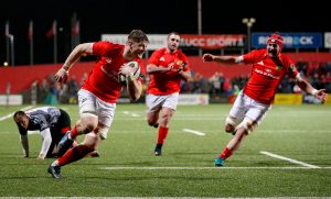 Jack O’Donoghue runs in for the fourth Munster try.