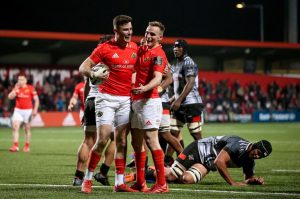 Shane Daly celebrates scoring a try with Nick McCarthy.