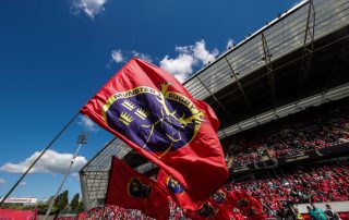 A general view of Thomond Park stand and fans with flags