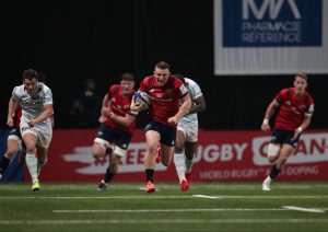 Andrew Conway runs in an intercept try against Racing 92.