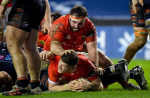 Jack O'Donoghue scores a try as James Cronin celebrates.