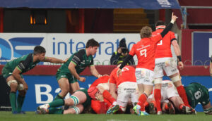 Craig Casey celebrates Cronin's try.