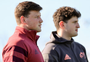 Fineen Wycherley watches on from the sidelines.