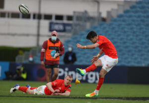 Conor Murray attempts a long-range penalty.