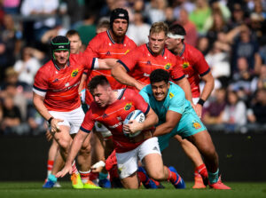 Niall Scannell is tackled by Rus Tuima.