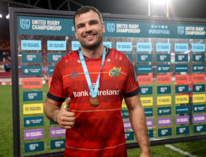 Tadhg Beirne is presented with the URC Player of the Match Medal.