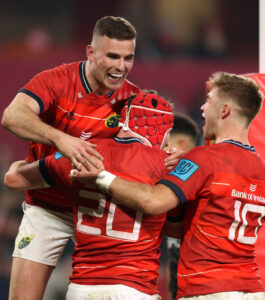 John Hodnett is congratulated by Jack Crowley and Shane Daly.