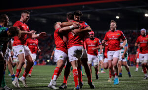 Matt Gallagher celebrates scoring with Craig Casey and Damian de Allende.