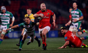 Jeremy Loughman goes through a gap.