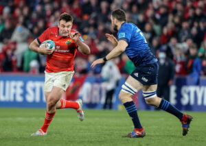 Niall Scannell takes on Josh Murphy.