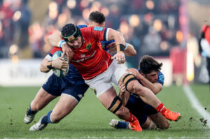 Chris Cloete is tackled by Robbie Henshaw and Jimmy O’Brien.