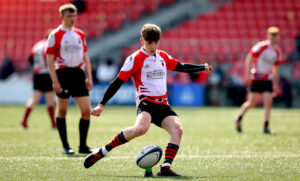 Jack Coady kicks a penalty