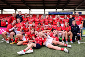 The Munster team celebrate after the game.