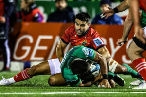Conor Murray tackles Jarrad Butler.