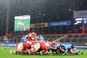 Conor Murray at a scrum as the rain comes down at Thomond Park.