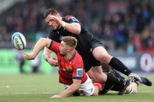 Jack Crowley offloads.