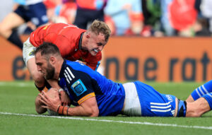 Jason Jenkins scores a try despite Craig Casey.