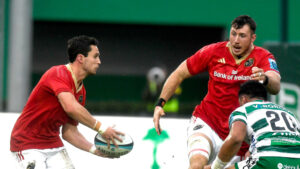 Joey Carbery offloads to Tom Ahern.