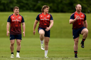 Emmett Calvey (centre) with Kieran Ryan and Oli Jager in May 2024.