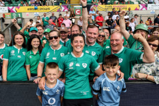 Amee-Leigh Costigan celebrates with her family and friends after the win over Japan.