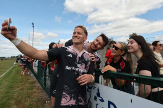 Mike Haley and Tom Ahern with supporters at Thurles RFC last week.