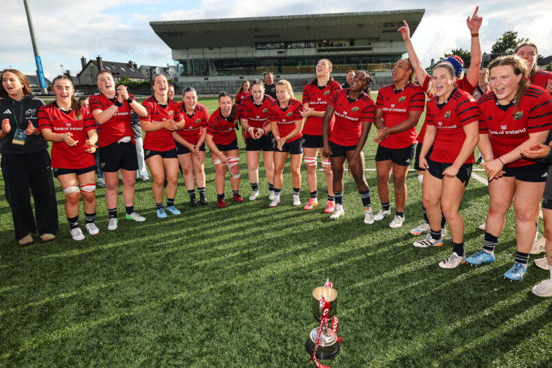 The Munster team celebrate with the Vodafone Women