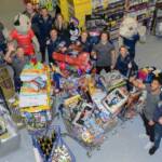 Festive trolley dash sees Sale Sharks stars collect £5,500-worth of gifts for children in Manchester